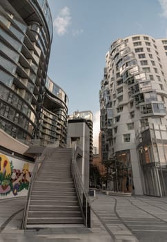 London, UK - Oct 16, 2023 - Area of Residential luxury apartment buildings at Battersea near to Battersea Power Station, Nine Elms. Modern apartment battersea buildings complex with balconies and architectural structure, Design urban geometry.
