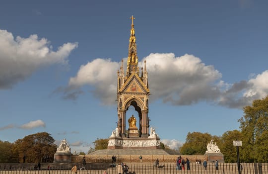 London, UK - Oct 24, 2023 - Exterior view of The Albert Memorial is in Kensington Gardens. Gothic Memorial to Prince Albert from Queen Victoria, Is a popular travel destination, Iconic, Space for text, Selective focus.