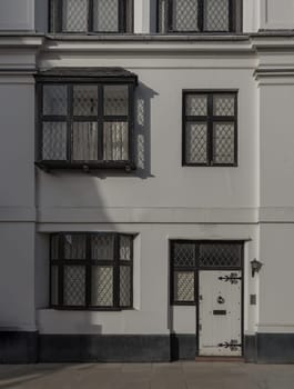 London, UK - Oct 24, 2023 - Facade of a house in De Vere Cottages and street light at South Kensington. Space for text, Selective focus.