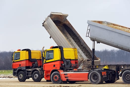 Two trucks on the construction site