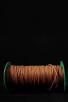 Roll of Twine isolated on a Black Background