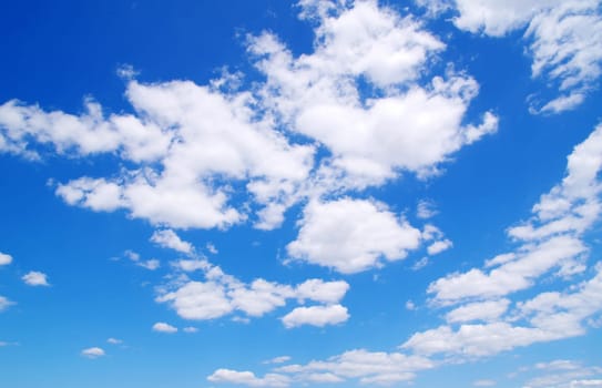 blue sky with clouds and sun