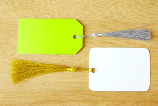 Blank tag isolated on a wooden background