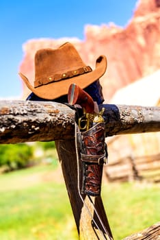 hat and gun in the far west, western spirit