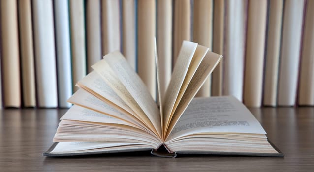 books on wooden deck tabletop