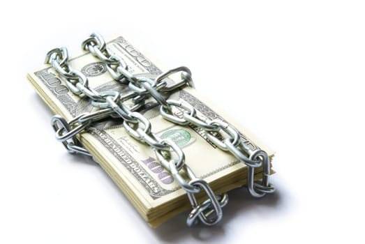 Dollars locked a chain on a white background