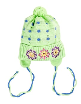 green baby knitted hat with a flower pattern on a white background