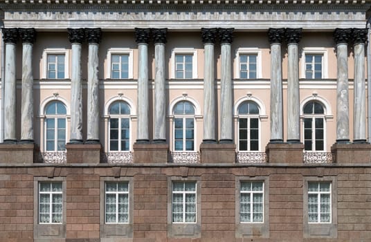 facade of an old building with columns