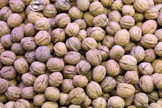 Background of raw walnuts in the market Rambla in Barcelona