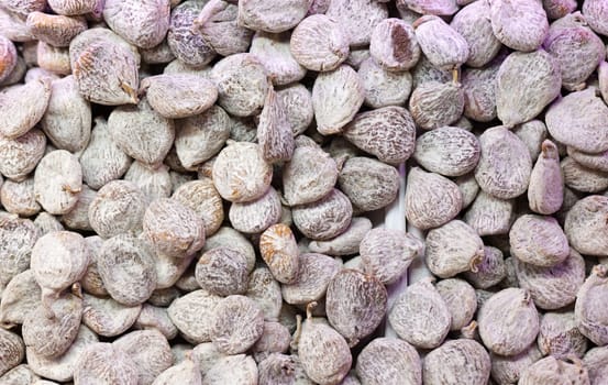Dried figs in flour as background