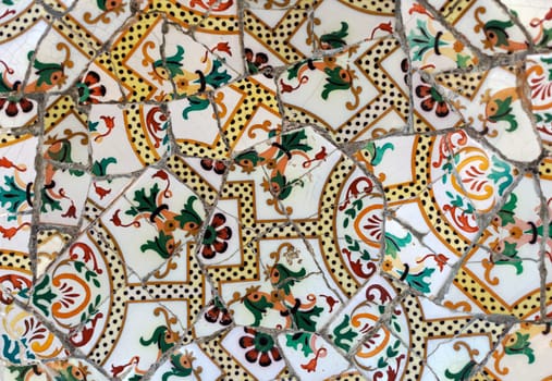 Detail of the ceramics from the Guadi in park Guell Barcelona, Spain.