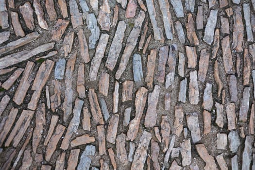 Background stone pavement of granite in barcelona.