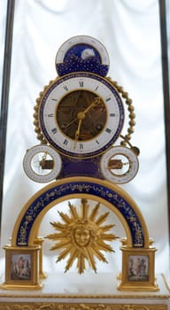 Antique clock in the Hermitage Museum. St. Petersburg, Russia