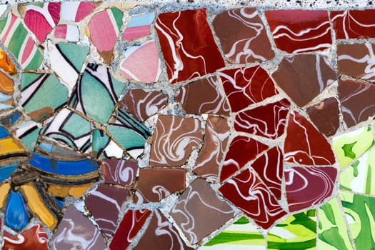 Detail of the ceramics from the Guadi in park Guell Barcelona, Spain