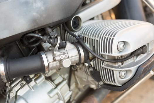 Internal combustion engine motorcycle close up.