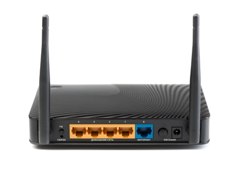 Wireless router for internet connections. The view from the rear side. Isolate on white.