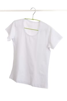 t-shirt with clothes hanger isolated on white