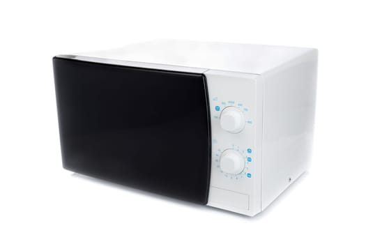 New microwave oven with analog control. Isolate on white