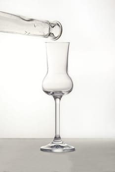 Pouring the Grappa into a glass