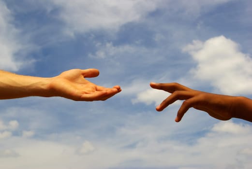 helping hand with the sky background