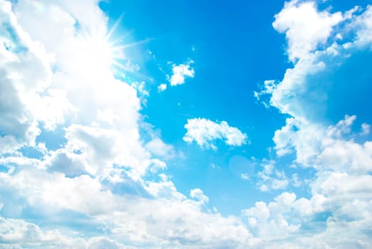 blue sky background with tiny clouds