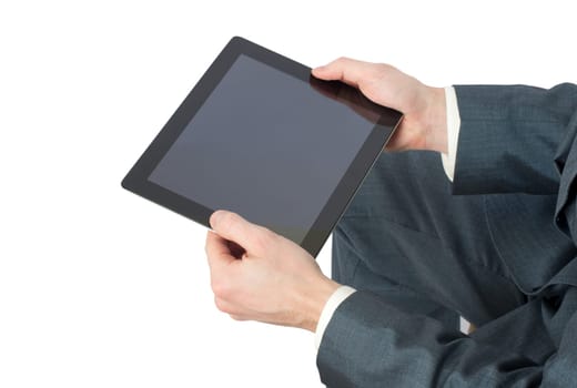 hands with tablet computer on white