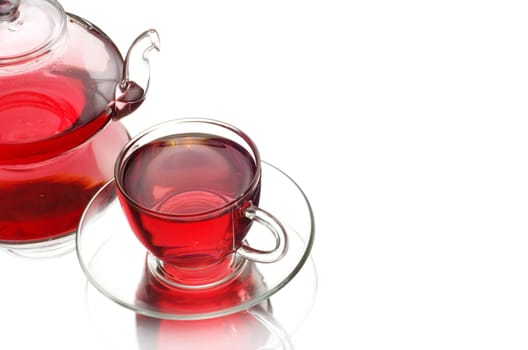 Tea being poured into glass tea cup