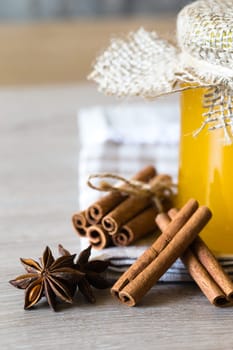 anise and cinnamon, on wooden table..