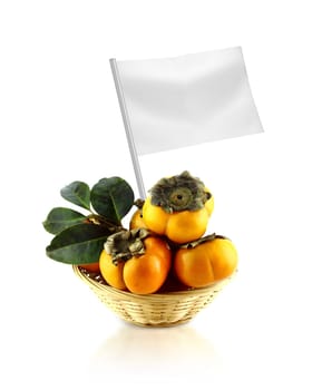 Healthy and organic food concept. Fresh persimmon with flag showing the benefits or the price of fruits.