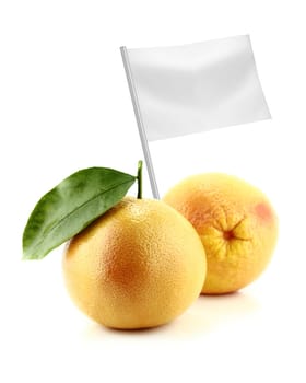 Healthy and organic food concept. Fresh Ripe appetizing grapefruit with flag showing the benefits or the price of fruits.