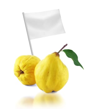 Healthy and organic food concept. Fresh sweet quinces with flag showing the benefits or the price of fruits.