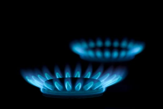 flames of gas stove in the dark