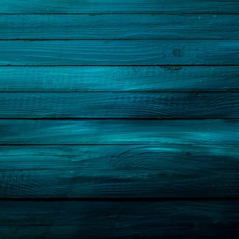 Vintage rustic background texture of wooden blue boards with uneven weathered coloring in square format, empty with copyspace