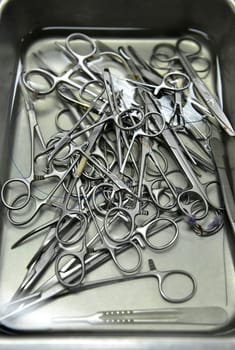 surgical instruments in anticeptic agent