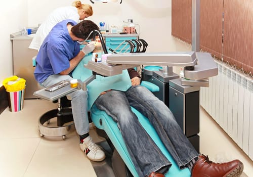 Dentist doctor and patient in dental clinic