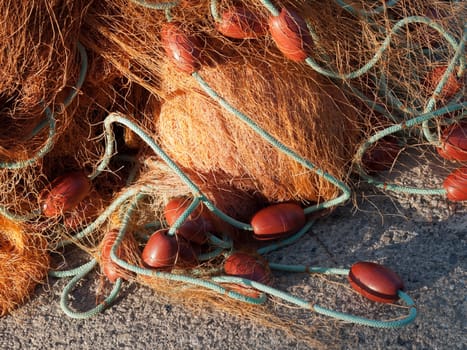 old fishing net with buoys in the port