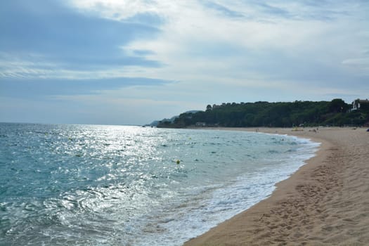Beach on sunset on mediterranean sea, Spain