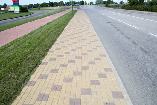 brick paved sideway at side of the street