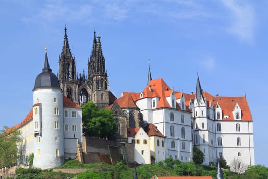 right: Albrechtsburg Meissen,to the left of it the round tower of the former bishop's castle (today district court),behind it the towers of the cathedral. Saxony. Germany.