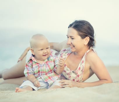 Baby and mother outdoor portrait