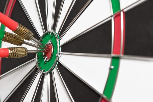 darts arrows in the target center