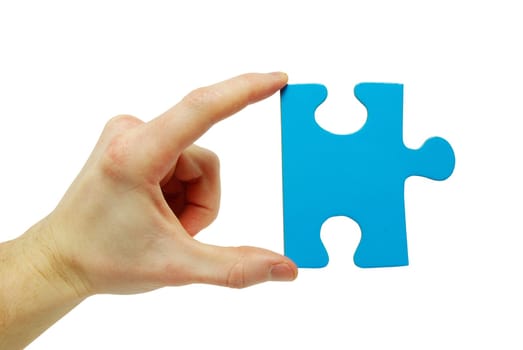 puzzle in hand isolated on white background