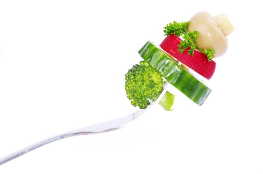 food on a fork isolated on white background