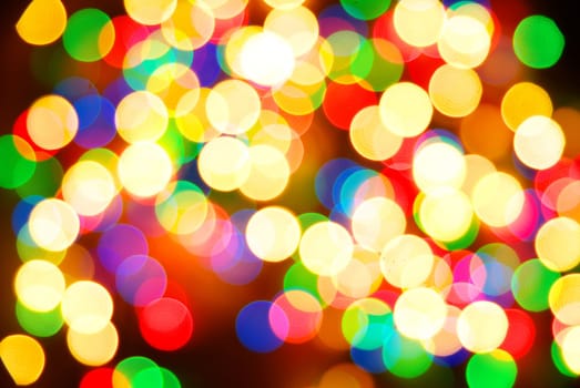 Abstract christmas lights as background on black