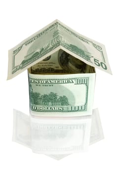 Money house on white background