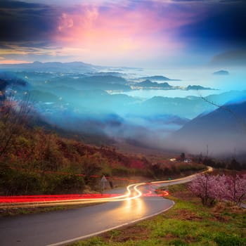 asphalt road and sea