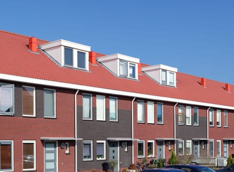 newly build terraced houses with dormer windows