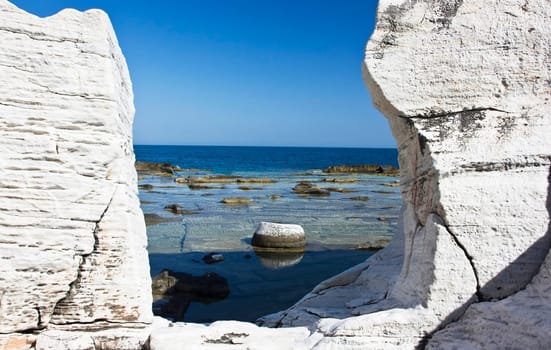 Blocks of marble in the sea on Aliki, Thassos island, Greece