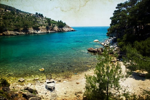 Boat in a bay on a greek island