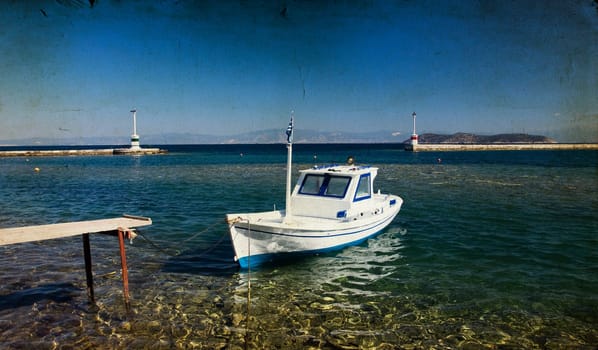 Vintage photo of a lonely greek boat